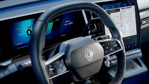 blue, white and red stitching on the steering wheel - Renault